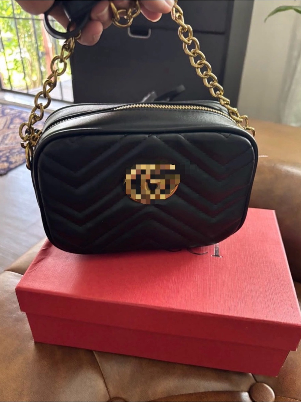 Black Quilted Crossbody Bag with Gold-Tone Chain Strap